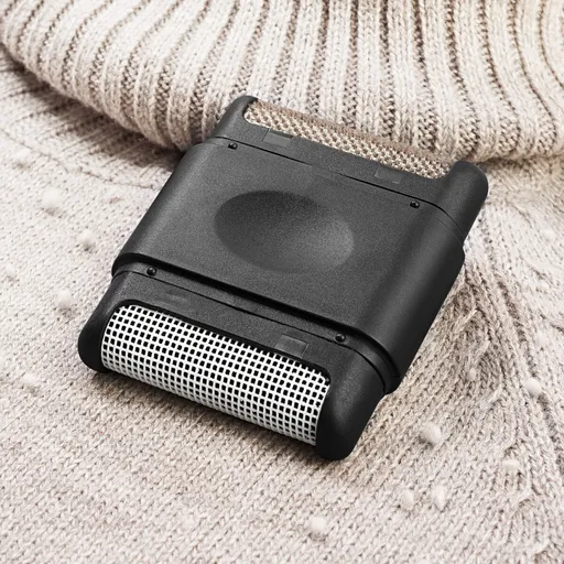 Dispozitiv pentru îndepărtarea scamelor