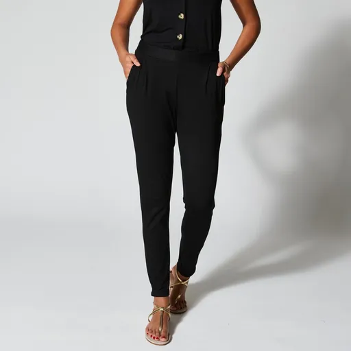 Pantaloni flexibili de o singură culoare în tricot aerisit