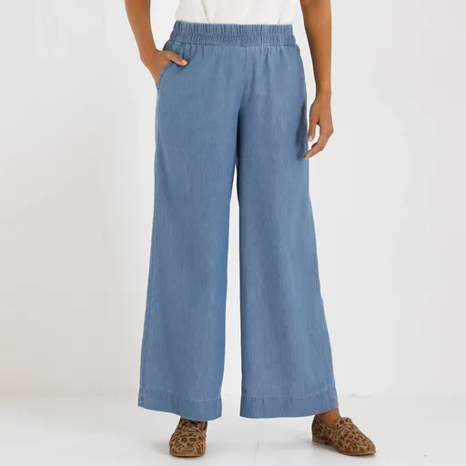 Pantaloni din denim cu talie elastică și croială largă