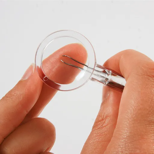 Pensetă cu lupă