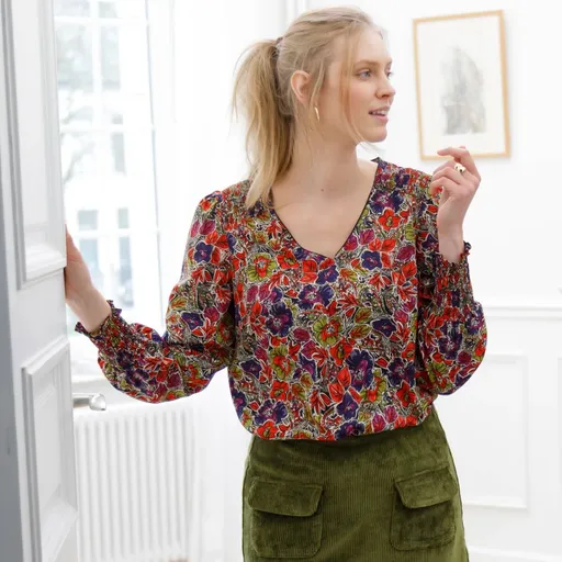 Bluză cu imprimeu floral și broderie