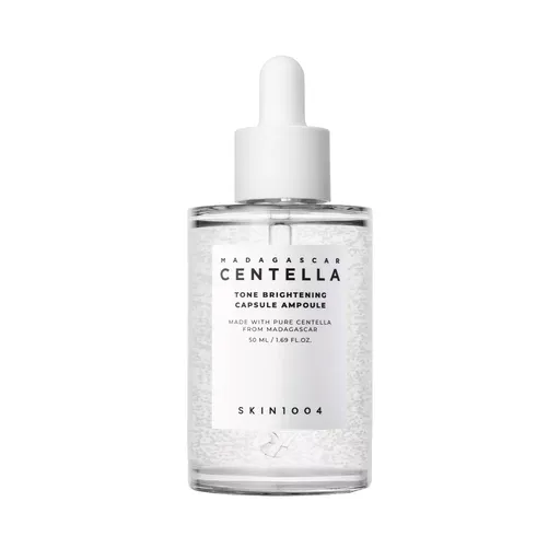 SKIN1004 Ser hidratant pentru iluminarea petelor pigmentare Madagascar Centella (Tone Brightening Capsule Ampoule) 50 ml