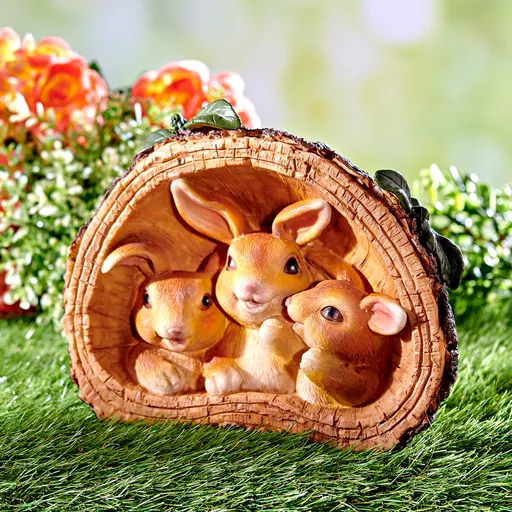 Familie de iepuri în vizuină