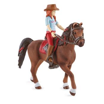 Schleich 42539 Roșcata Hannah cu articulațiimobile, pe cal, 15 cm