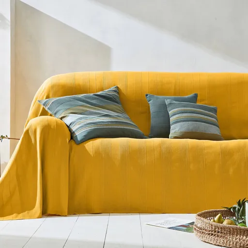 Colecție de cuverturi și fețe de pernă țesute manual, în culori uni