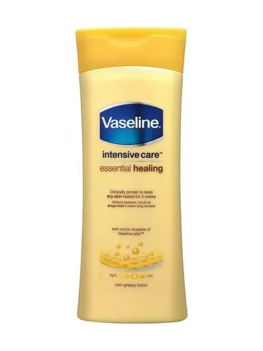 Vaseline Lapte de corp hidratant pentru pielea uscată (Essential Healing Lotion) 400 ml
