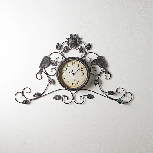 Ceas de perete ornamentat