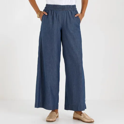 Pantaloni din denim cu talie elastică și croială largă