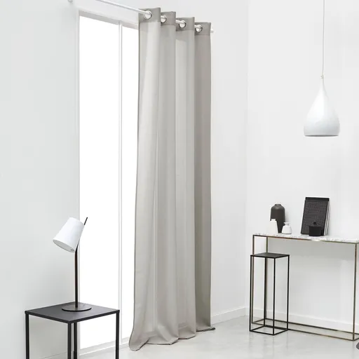 Perdea unicoloră, finisată cu ochiuri de ochi