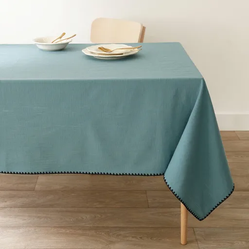 O față de masă din bumbac monocolor, cu un finisaj original