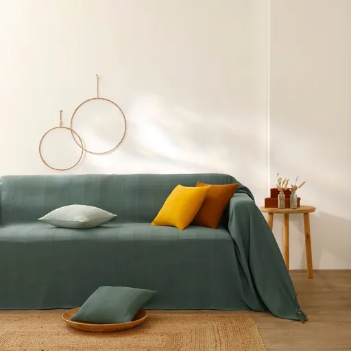 Colecție de cuverturi și fețe de pernă țesute manual, în culori uni