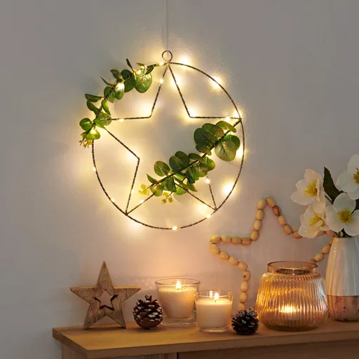 Stea metalică cu frunze si LED-uri